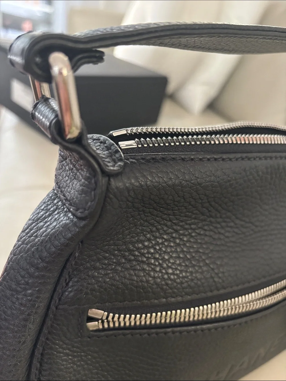 CHANEL Black Pebbled Leather Shoulder Bag with Tassel Zip
